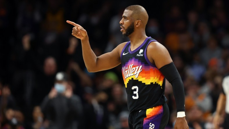 Feb 1, 2022; Phoenix, Arizona, USA; Phoenix Suns guard Chris Paul (3) reacts against the Brooklyn Nets at Footprint Center. Mandatory Credit: Mark J. Rebilas-USA TODAY Sports