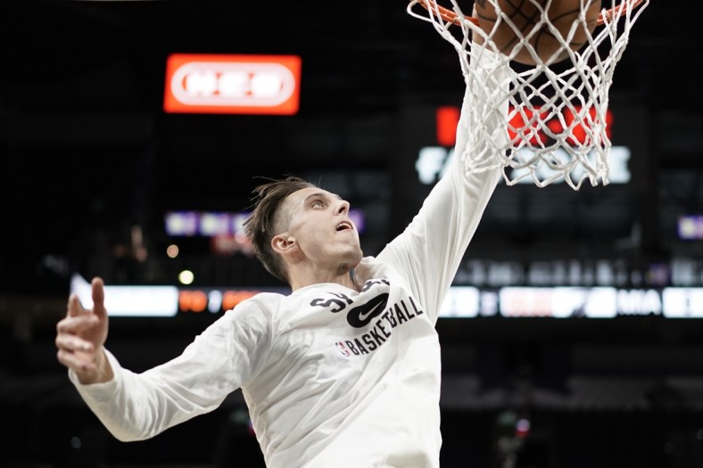 Feb 3, 2022; San Antonio, Texas, USA; San Antonio Spurs forward Zach Collins (23) dunks before the game against the Miami Heat at AT&T Center. Mandatory Credit: Scott Wachter-USA TODAY Sports