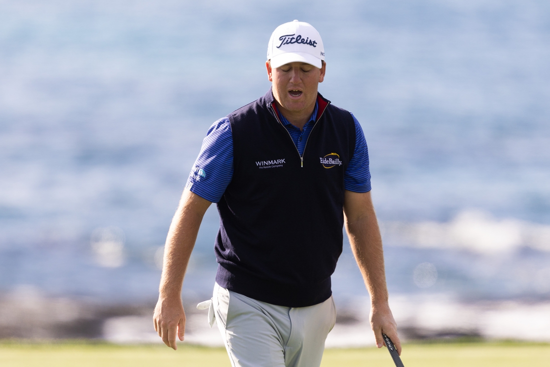 Feb 3, 2022; Pebble Beach, California, USA; Tom Hoge reacts after missing a birdie put on his final hole in the first round of the AT&T Pebble Beach Pro-Am golf tournament at Pebble Beach Golf Links. Mandatory Credit: Bill Streicher-USA TODAY Sports