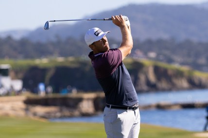 Feb 4, 2022; Pebble Beach, California, USA; Seamus Power plays his approach shot on the eighteenth hole during the second round of the AT&T Pebble Beach Pro-Am golf tournament at Pebble Beach Golf Links. Mandatory Credit: Bill Streicher-USA TODAY Sports
