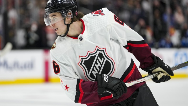 Feb 5, 2022; Las Vegas, Nevada, USA; Metropolitan Division forward Jack Hughes (86) of the New Jersey Devils skates during the 2022 NHL All-Star Game at T-Mobile Arena. Mandatory Credit: Stephen R. Sylvanie-USA TODAY Sports