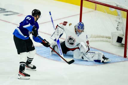 Feb 5, 2022; Las Vegas, Nevada, USA; Atlantic Division goalie Andrei Vasilevskiy (88) of the Tampa Bay Lightning makes a save in net against Central Division forward Nazem Kadri (91) of the Colorado Avalanche during the 2022 NHL All-Star Game at T-Mobile Arena. Mandatory Credit: Lucas Peltier-USA TODAY Sports
