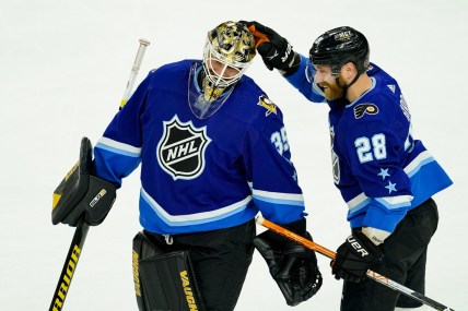 Feb 5, 2022; Las Vegas, Nevada, USA; Metropolitan Division goalie Tristan Jarry (35) of the Pittsburgh Penguins reacts with Metropolitan Division forward Claude Giroux (28) of the Philadelphia Flyers during the 2022 NHL All-Star Game at T-Mobile Arena. Mandatory Credit: Lucas Peltier-USA TODAY Sports