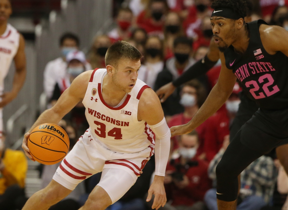 No. 11 Wisconsin ekes out 51-49 win over Penn St.