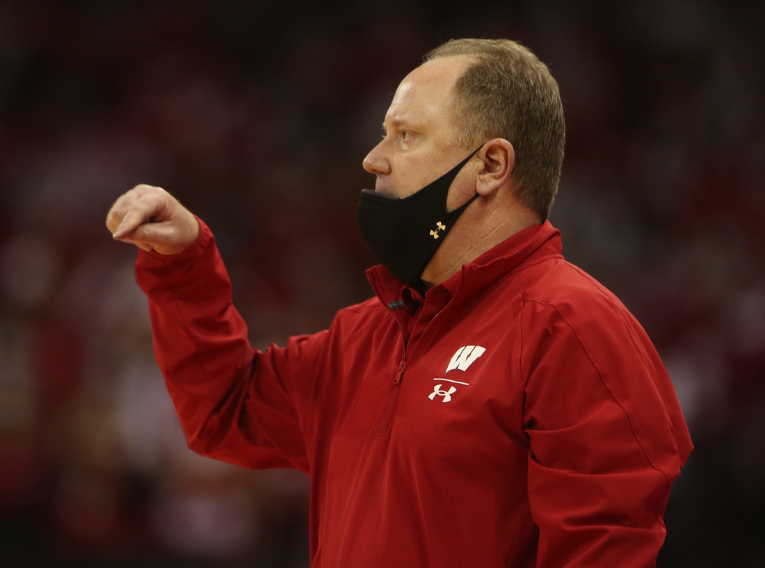 Feb 5, 2022; Madison, Wisconsin, USA; Wisconsin Badgers head coach Greg Gard directs his team in the game with the Penn State Nittany Lions at the Kohl Center. Mandatory Credit: Mary Langenfeld-USA TODAY Sports