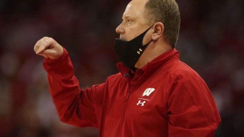 Feb 5, 2022; Madison, Wisconsin, USA; Wisconsin Badgers head coach Greg Gard directs his team in the game with the Penn State Nittany Lions at the Kohl Center. Mandatory Credit: Mary Langenfeld-USA TODAY Sports