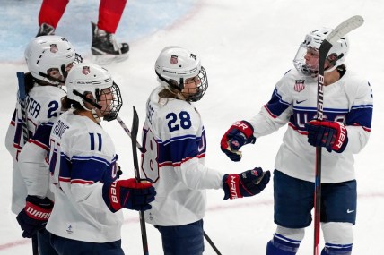 Feb 6, 2022; Beijing, China; Team United States forward Amanda Kessel (28) is congratulated after scoring a goal against Switzerland during the first period during the Beijing 2022 Olympic Winter Games at Wukesong Sports Centre. Mandatory Credit: George Walker IV-USA TODAY Sports