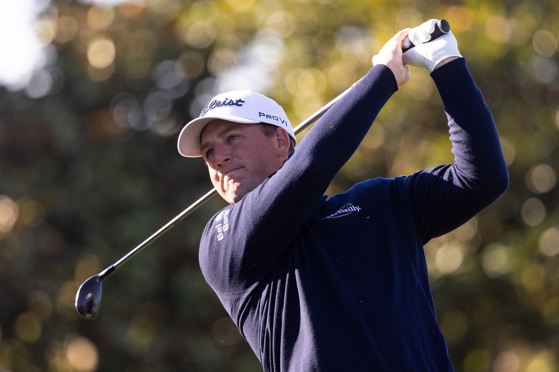 Feb 6, 2022; Pebble Beach, California, USA; Tom Hoge plays his shot from the first tee during the final round of the AT&T Pebble Beach Pro-Am golf tournament at Pebble Beach Golf Links. Mandatory Credit: Bill Streicher-USA TODAY Sports