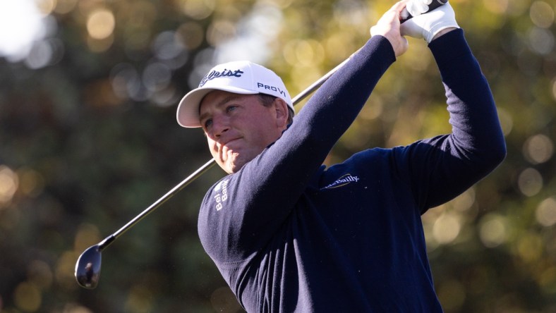 Feb 6, 2022; Pebble Beach, California, USA; Tom Hoge plays his shot from the first tee during the final round of the AT&T Pebble Beach Pro-Am golf tournament at Pebble Beach Golf Links. Mandatory Credit: Bill Streicher-USA TODAY Sports