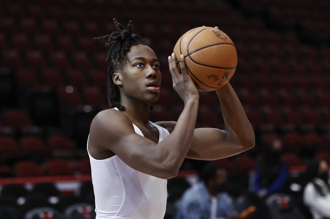 Feb 6, 2022; Chicago, Illinois, USA; Chicago Bulls guard Ayo Dosunmu (12) warms up before an NBA game against the Philadelphia 76ers at United Center. Mandatory Credit: Kamil Krzaczynski-USA TODAY Sports