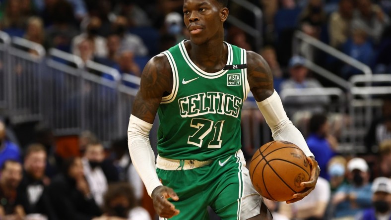 Feb 6, 2022; Orlando, Florida, USA; Boston Celtics guard Dennis Schroder (71) drives to the basket against the Orlando Magic during the second half at Amway Center. Mandatory Credit: Kim Klement-USA TODAY Sports