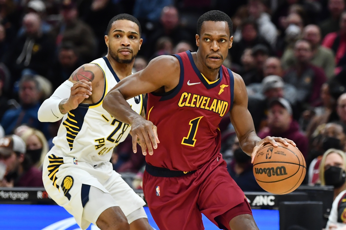 Feb 6, 2022; Cleveland, Ohio, USA; Cleveland Cavaliers guard Rajon Rondo (1) drives to the basket against Indiana Pacers guard Keifer Sykes (28) during the second half at Rocket Mortgage FieldHouse. Mandatory Credit: Ken Blaze-USA TODAY Sports