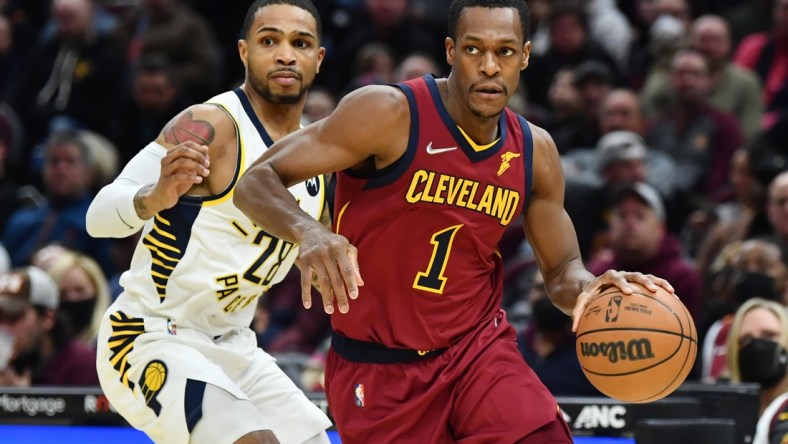 Feb 6, 2022; Cleveland, Ohio, USA; Cleveland Cavaliers guard Rajon Rondo (1) drives to the basket against Indiana Pacers guard Keifer Sykes (28) during the second half at Rocket Mortgage FieldHouse. Mandatory Credit: Ken Blaze-USA TODAY Sports