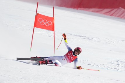 Feb 7, 2022; Yanqing, China; Mikaela Shiffrin (USA) falls and misses a gate during the womens giant slalom during the Beijing 2022 Olympic Winter Games at Yanqing Alpine Skiing Centre. Mandatory Credit: Eric Bolte-USA TODAY Sports