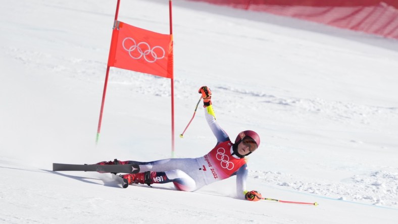 Feb 7, 2022; Yanqing, China; Mikaela Shiffrin (USA) falls and misses a gate during the womens giant slalom during the Beijing 2022 Olympic Winter Games at Yanqing Alpine Skiing Centre. Mandatory Credit: Eric Bolte-USA TODAY Sports