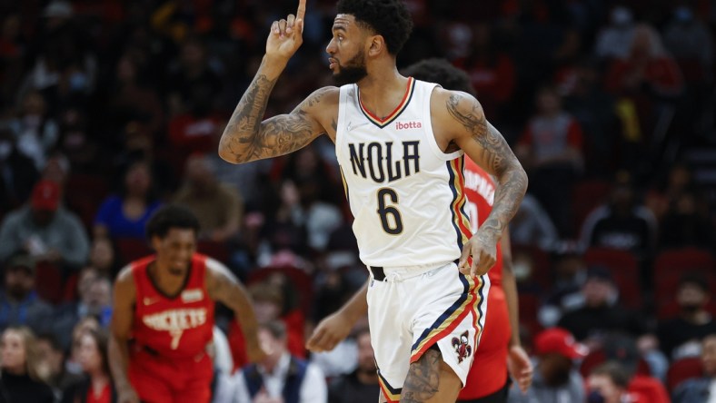 Feb 6, 2022; Houston, Texas, USA; New Orleans Pelicans guard Nickeil Alexander-Walker (6) reacts after scoring a basket during the third quarter against the Houston Rockets at Toyota Center. Mandatory Credit: Troy Taormina-USA TODAY Sports