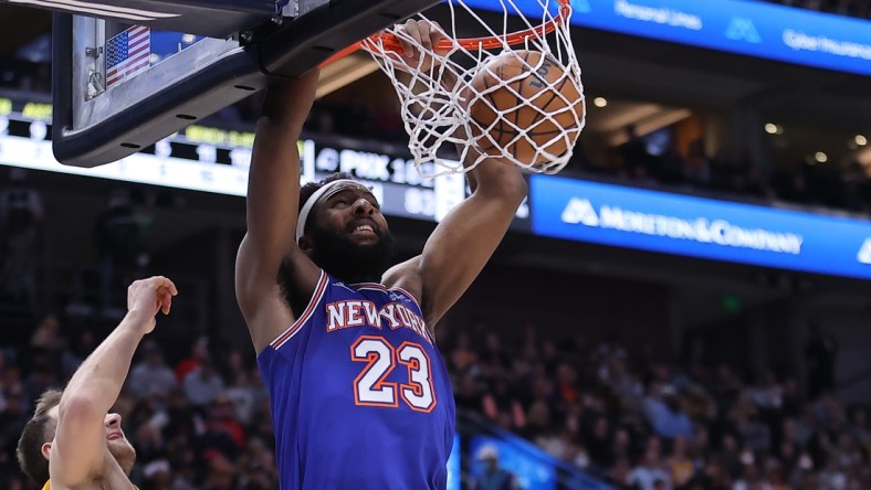 Feb 7, 2022; Salt Lake City, Utah, USA; New York Knicks center Mitchell Robinson (23) dunks the ball in the second quarter against the Utah Jazz at Vivint Arena. Mandatory Credit: Rob Gray-USA TODAY Sports