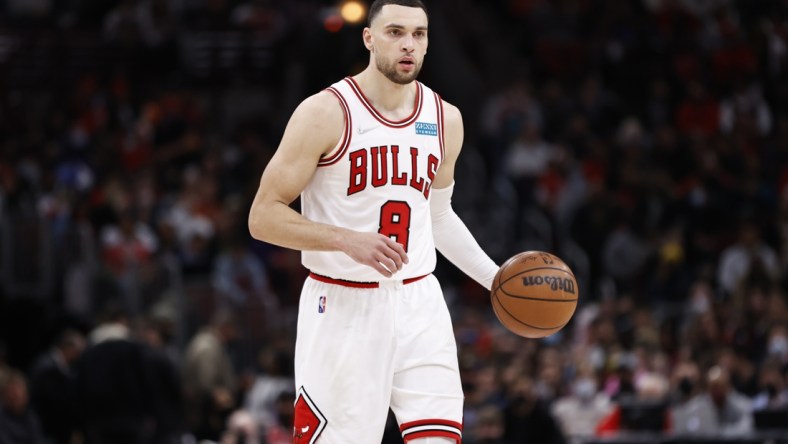 Feb 7, 2022; Chicago, Illinois, USA; Chicago Bulls guard Zach LaVine (8) brings the ball up court against the Phoenix Suns during the second half at United Center. Mandatory Credit: Kamil Krzaczynski-USA TODAY Sports