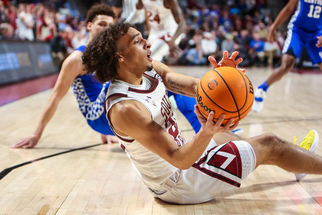 Feb 8, 2022; Columbia, South Carolina, USA; South Carolina Gamecocks guard Devin Carter (23) looks to pass against the Kentucky Wildcats in the first half at Colonial Life Arena. Mandatory Credit: Jeff Blake-USA TODAY Sports