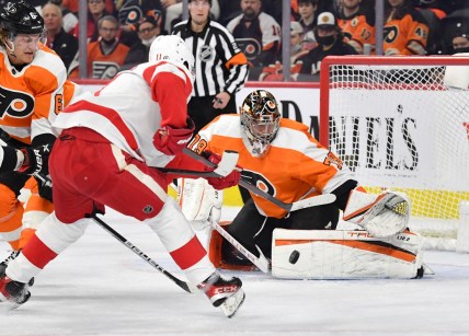 Feb 9, 2022; Philadelphia, Pennsylvania, USA; Philadelphia Flyers goaltender Carter Hart (79) makes a save against Detroit Red Wings right wing Filip Zadina (11) during the first period at Wells Fargo Center. Mandatory Credit: Eric Hartline-USA TODAY Sports