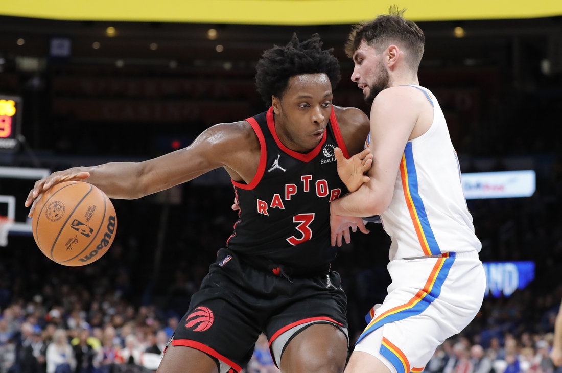 Feb 9, 2022; Oklahoma City, Oklahoma, USA; Toronto Raptors forward OG Anunoby (3) moves to the basket against Oklahoma City Thunder guard Ty Jerome (16) during the second quarter at Paycom Center. Mandatory Credit: Alonzo Adams-USA TODAY Sports