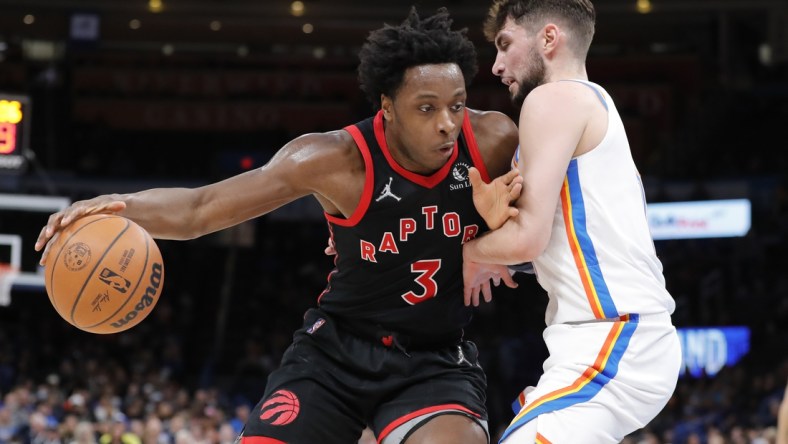 Feb 9, 2022; Oklahoma City, Oklahoma, USA; Toronto Raptors forward OG Anunoby (3) moves to the basket against Oklahoma City Thunder guard Ty Jerome (16) during the second quarter at Paycom Center. Mandatory Credit: Alonzo Adams-USA TODAY Sports