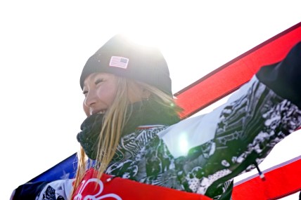 Feb 10, 2022; Zhangjiakou, China; Chloe Kim (USA) celebrates winning the gold medal in the Women   s Snowboarding Halfpipe Final during the Beijing 2022 Olympic Winter Games at Genting Snow Park. Mandatory Credit: Danielle Parhizkaran-USA TODAY Sports