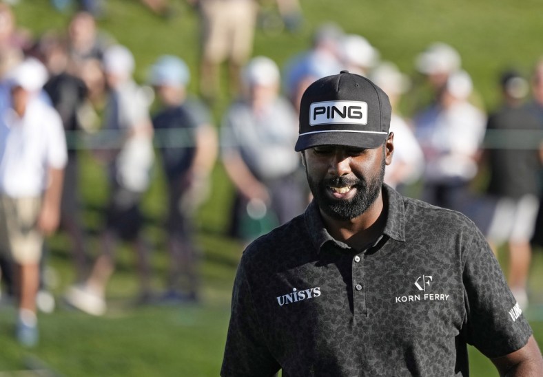 Feb 10, 2022; Scottsdale, AZ, USA; Sahith Theegala smiles during the first round of the Waste Management Phoenix Open golf tournament. Mandatory Credit: Cheryl Evans-Arizona Republic-USA TODAY NETWORK