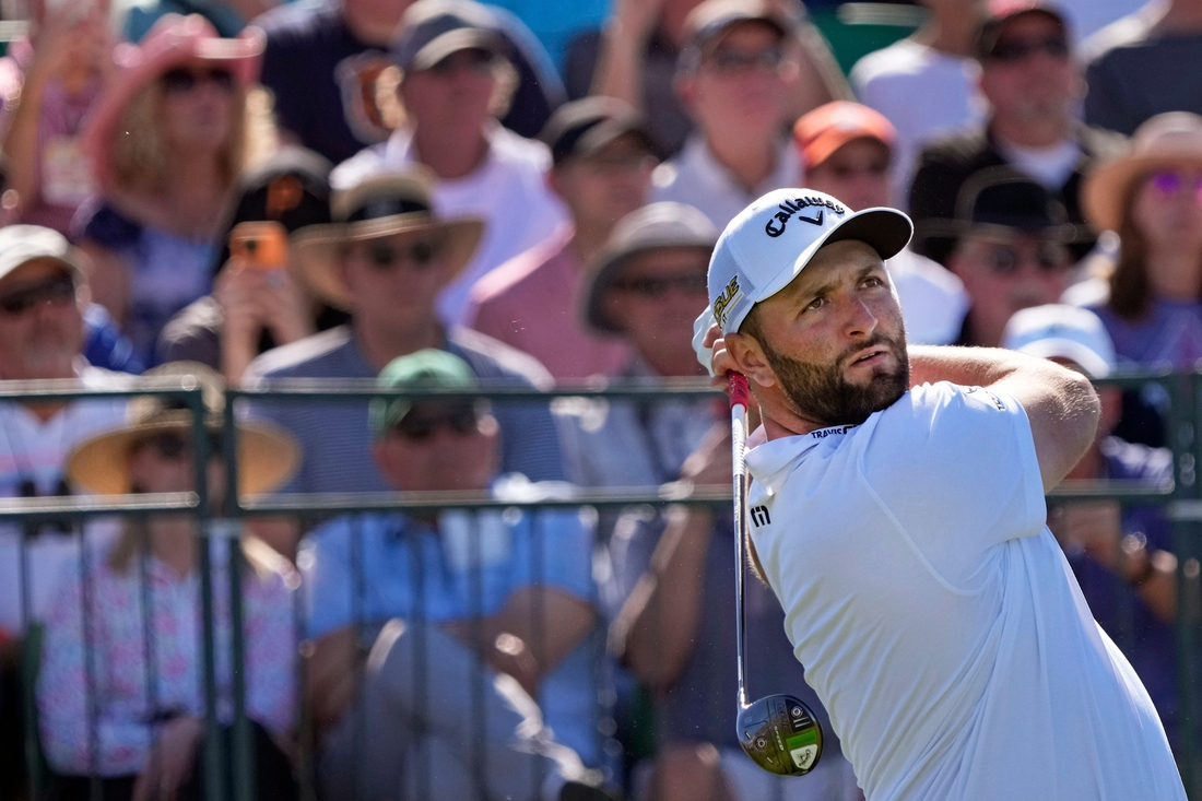 Feb 10, 2022; Scottsdale, AZ, USA;  Jon Rahm hits from the 1st tee box during Round 1 of the WM Phoenix Open at TPC Scottsdale. Mandatory Credit: Cheryl Evans-Arizona Republic

Golf Wm Phoenix Open Day 1