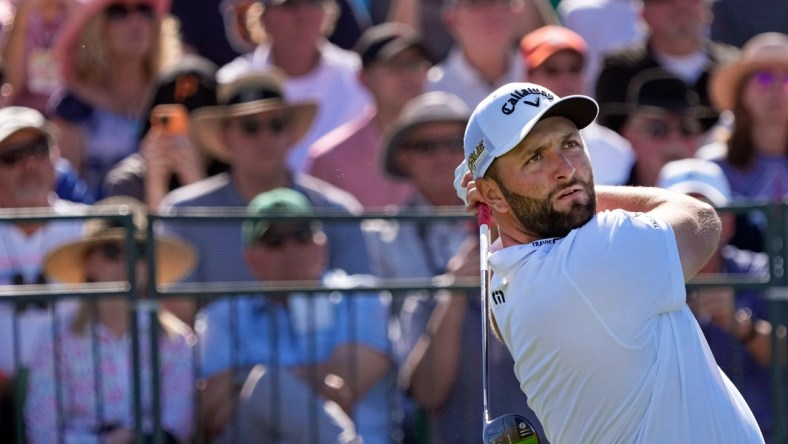 Feb 10, 2022; Scottsdale, AZ, USA;  Jon Rahm hits from the 1st tee box during Round 1 of the WM Phoenix Open at TPC Scottsdale. Mandatory Credit: Cheryl Evans-Arizona Republic

Golf Wm Phoenix Open Day 1