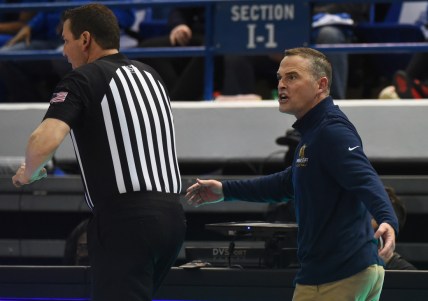 Feb 10, 2022; Nashville, Tennessee, USA; Murray State Racers head coach Matt McMahon (right) questions a non-call by an official during the second half against the Tennessee State Tigers at Gentry Complex. Mandatory Credit: Christopher Hanewinckel-USA TODAY Sports