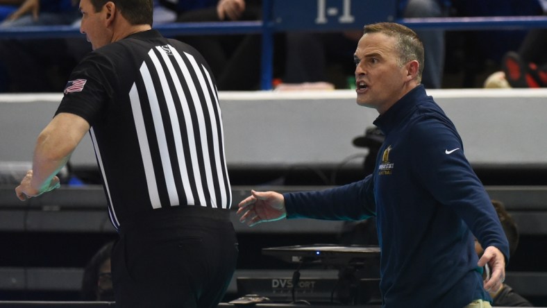 Feb 10, 2022; Nashville, Tennessee, USA; Murray State Racers head coach Matt McMahon (right) questions a non-call by an official during the second half against the Tennessee State Tigers at Gentry Complex. Mandatory Credit: Christopher Hanewinckel-USA TODAY Sports