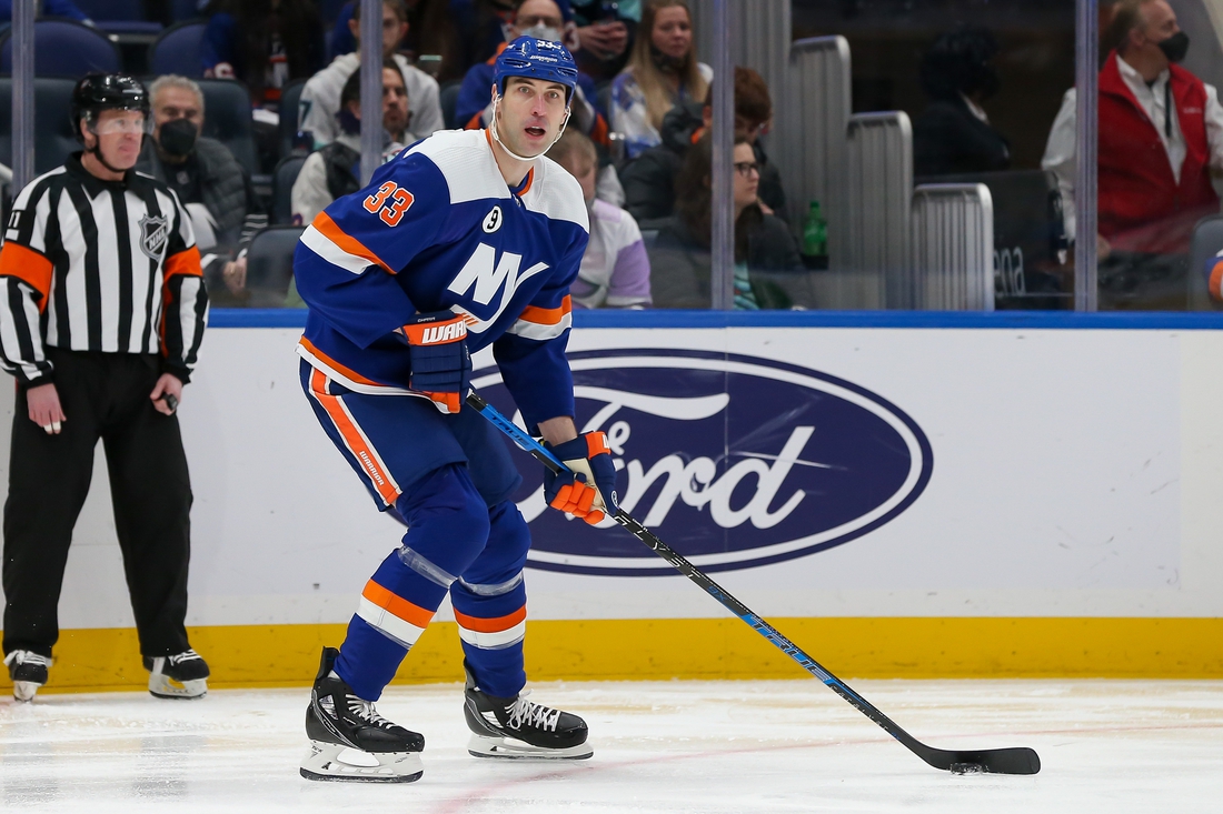 Feb 2, 2022; Elmont, New York, USA; New York Islanders defenseman Zdeno Chara (33) looks to pass against Seattle Kraken during the first period at UBS Arena. Mandatory Credit: Tom Horak-USA TODAY Sports