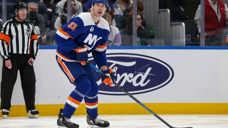 Feb 2, 2022; Elmont, New York, USA; New York Islanders defenseman Zdeno Chara (33) looks to pass against Seattle Kraken during the first period at UBS Arena. Mandatory Credit: Tom Horak-USA TODAY Sports