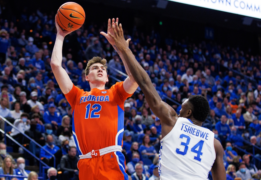 Feb 12, 2022; Lexington, Kentucky, USA; Florida Gators forward Colin Castleton (12) shoots the ball during the first half against the Kentucky Wildcats at Rupp Arena at Central Bank Center. Mandatory Credit: Jordan Prather-USA TODAY Sports