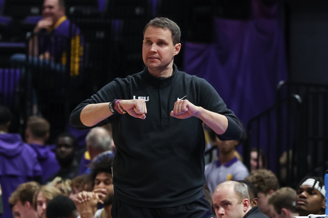 Feb 12, 2022; Baton Rouge, Louisiana, USA;  LSU Tigers coach Will Wade calls in a play from the bench against the Mississippi State Bulldogs during the second half at the Pete Maravich Assembly Center. Mandatory Credit: Stephen Lew-USA TODAY Sports