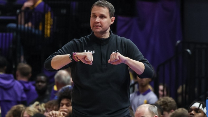 Feb 12, 2022; Baton Rouge, Louisiana, USA;  LSU Tigers coach Will Wade calls in a play from the bench against the Mississippi State Bulldogs during the second half at the Pete Maravich Assembly Center. Mandatory Credit: Stephen Lew-USA TODAY Sports