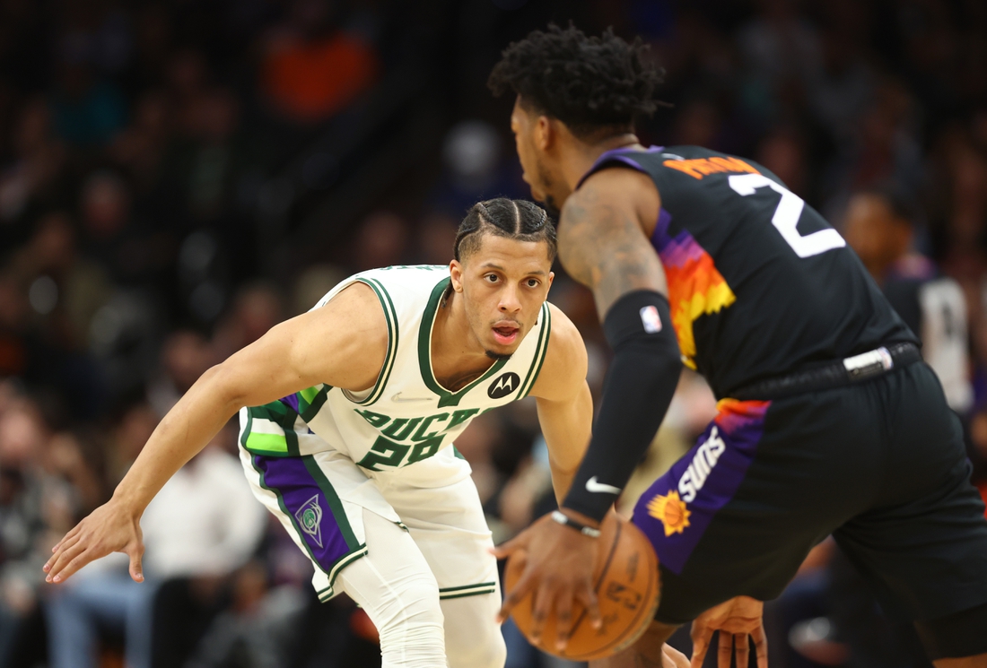 Feb 10, 2022; Phoenix, Arizona, USA; Milwaukee Bucks guard Lindell Wigginton (28) against the Phoenix Suns at Footprint Center. Mandatory Credit: Mark J. Rebilas-USA TODAY Sports