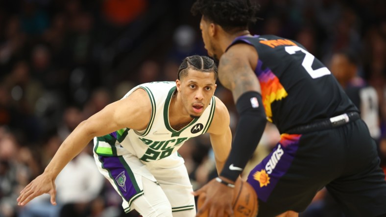 Feb 10, 2022; Phoenix, Arizona, USA; Milwaukee Bucks guard Lindell Wigginton (28) against the Phoenix Suns at Footprint Center. Mandatory Credit: Mark J. Rebilas-USA TODAY Sports