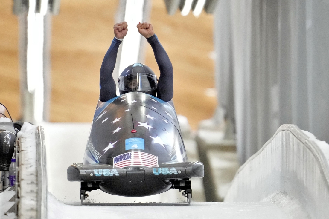 Feb 14, 2022; Yanqing, China; Elana Meyers Taylor (USA) celebrates winning the silver medal in the women   s monobob during the Beijing 2022 Olympic Winter Games at Yanqing Sliding Centre. Mandatory Credit: Harrison Hill-USA TODAY Sports