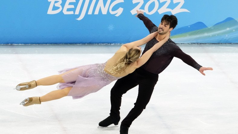 Feb 14, 2022; Beijing, China; Madison Hubbell and Zachary Donohue (USA) compete in the mixed ice dance free dance during the Beijing 2022 Olympic Winter Games at Capital Indoor Stadium. Mandatory Credit: Rob Schumacher-USA TODAY Sports