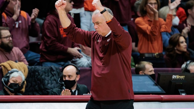 Feb 14, 2022; Blacksburg, Virginia, USA; Virginia Tech Hokies head coach Mike Young reacts during the second half of the college basketball game between the Virginia Tech Hokies and the Virginia Cavaliers at Cassell Coliseum. Mandatory Credit: Ryan Hunt-USA TODAY Sports