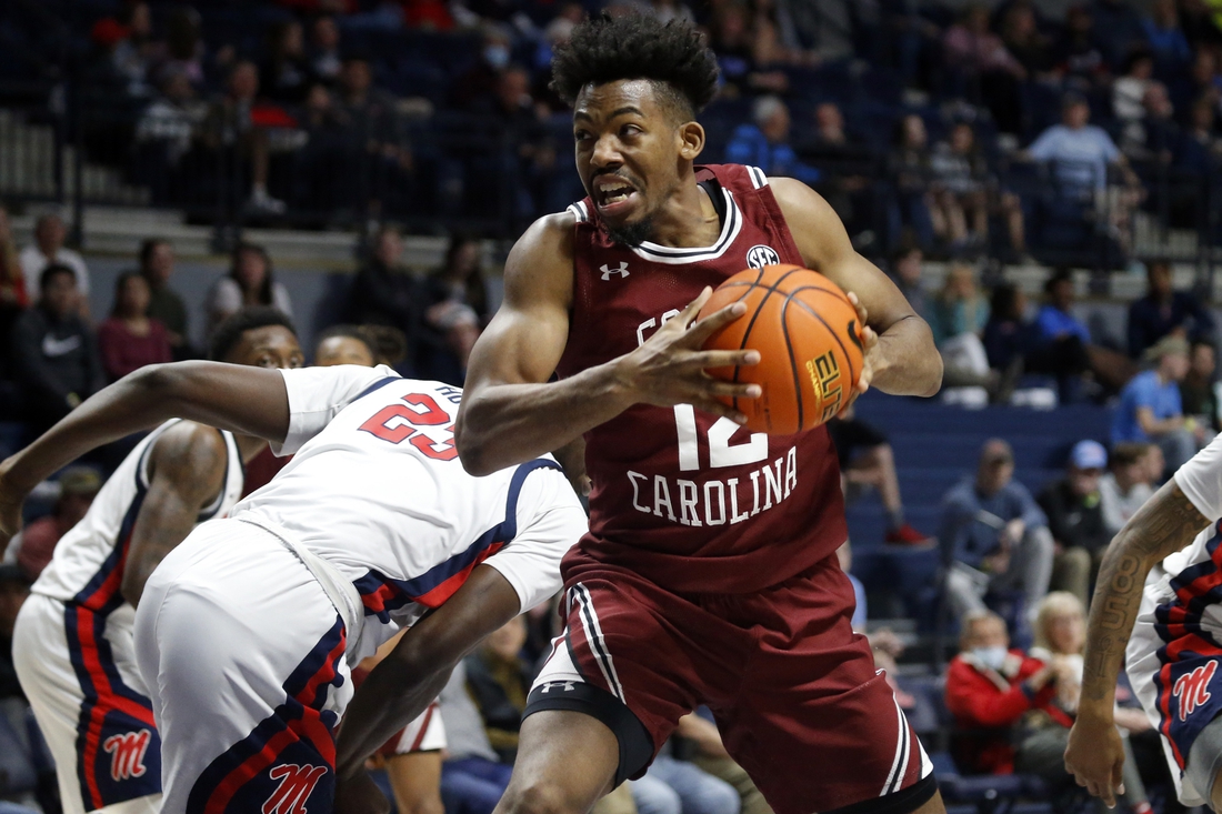 Feb 15, 2022; Oxford, Mississippi, USA; South Carolina Gamecocks forward AJ Wilson (12) spins toward the basket during the first half against the Mississippi Rebels at The Sandy and John Black Pavilion at Ole Miss. Mandatory Credit: Petre Thomas-USA TODAY Sports