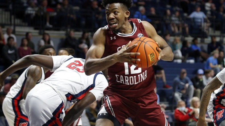 Feb 15, 2022; Oxford, Mississippi, USA; South Carolina Gamecocks forward AJ Wilson (12) spins toward the basket during the first half against the Mississippi Rebels at The Sandy and John Black Pavilion at Ole Miss. Mandatory Credit: Petre Thomas-USA TODAY Sports