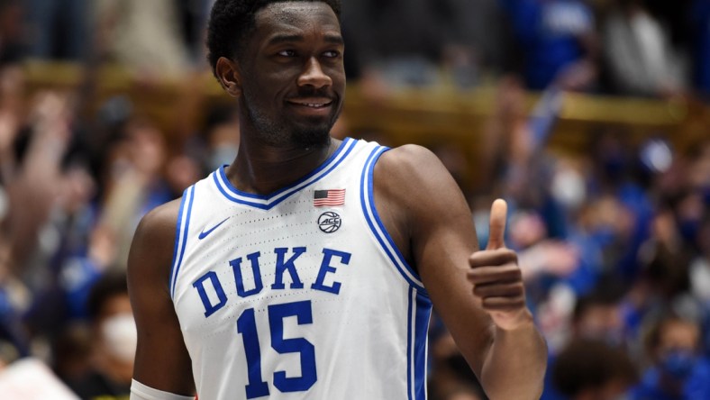 Feb 15, 2022; Durham, North Carolina, USA; Duke Blue Devils center Mark Williams(15) gestures to associate head coach Jon Scheyer (not pictured) during the second half against the Wake Forest Demon Deacons at Cameron Indoor Stadium.  The Blue Devils won 76-74. Mandatory Credit: Rob Kinnan-USA TODAY Sports