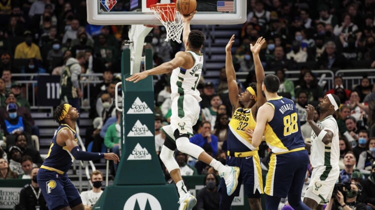 Feb 15, 2022; Milwaukee, Wisconsin, USA;  Milwaukee Bucks forward Giannis Antetokounmpo (34) drives for a layup during the fourth quarter against the Indiana Pacers at Fiserv Forum. Mandatory Credit: Jeff Hanisch-USA TODAY Sports