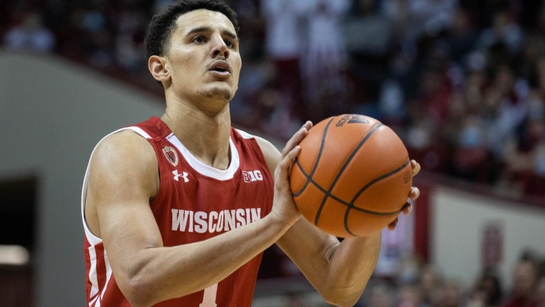 Feb 15, 2022; Bloomington, Indiana, USA; Wisconsin Badgers guard Johnny Davis (1) shoots a free throw in the second half against the Indiana Hoosiers at Simon Skjodt Assembly Hall. Mandatory Credit: Trevor Ruszkowski-USA TODAY Sports