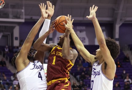 Feb 15, 2022; Fort Worth, Texas, USA;  Iowa State Cyclones guard Izaiah Brockington (1) looks to shoot as TCU Horned Frogs center Eddie Lampkin (4) and guard Mike Miles (1) defend during the second half at Ed and Rae Schollmaier Arena. Mandatory Credit: Kevin Jairaj-USA TODAY Sports