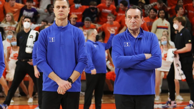 Feb 10, 2022; Clemson, South Carolina, USA; Duke Blue Devils head coach Mike Krzyzewski (right) and associate head coach Jon Scheyer prior to the game against the Clemson Tigers at Littlejohn Coliseum. Mandatory Credit: Dawson Powers-USA TODAY Sports