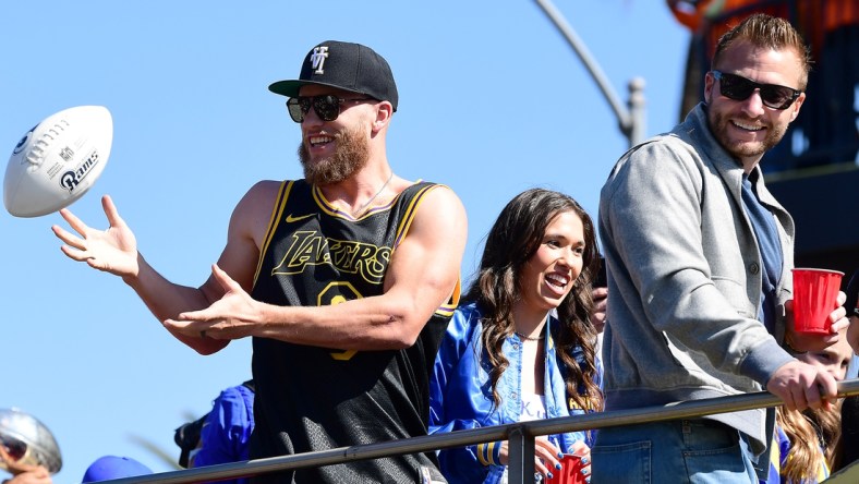 Feb 16, 2022; Los Angeles, CA, USA; Los Angeles Rams wide receiver Cooper Kupp and head coach Sean McVay celebrate during the championship victory parade. Mandatory Credit: Gary A. Vasquez-USA TODAY Sports